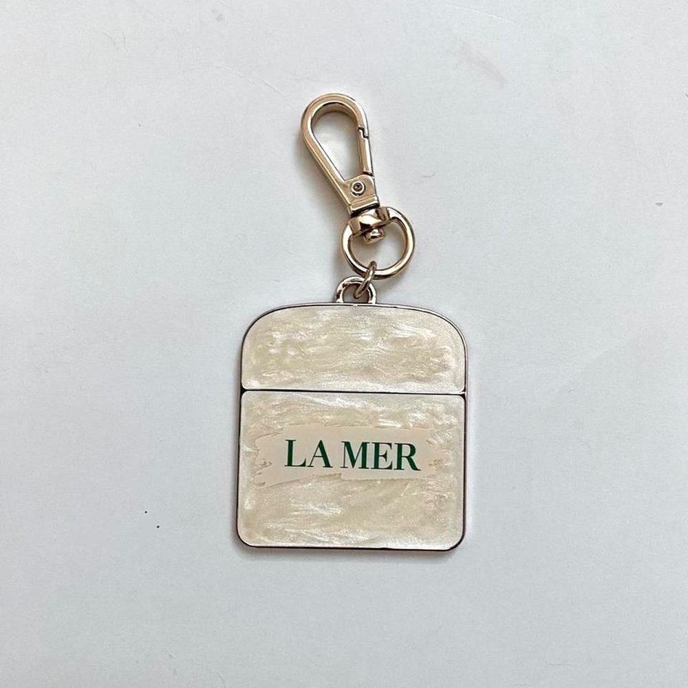 Authentic La Mer Keychain with Cream and Silver Finish